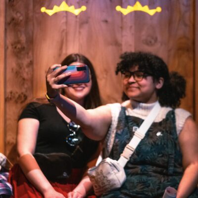 People taking a selfie at the Museum of Pop Culture.