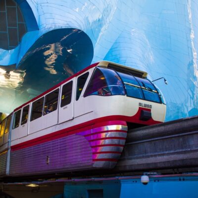 Seattle Monorail Red Train with MoPOP architecture.