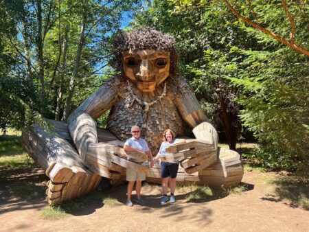 People posing with the Bainbridge Island Troll.